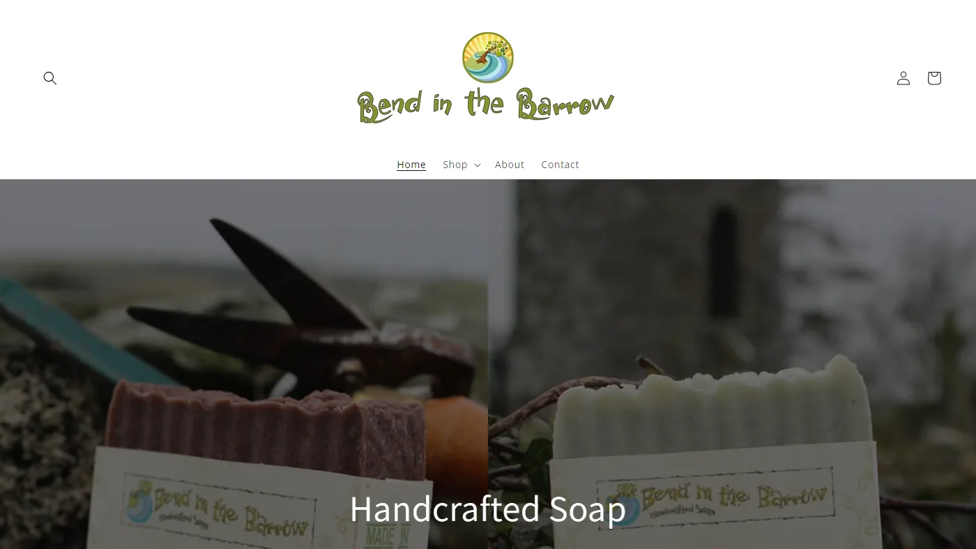 The Bend in the Barrow homepage: a hand-drawn green logo and a short menu, with Handcrafted Soap set over two labelled soap bars.