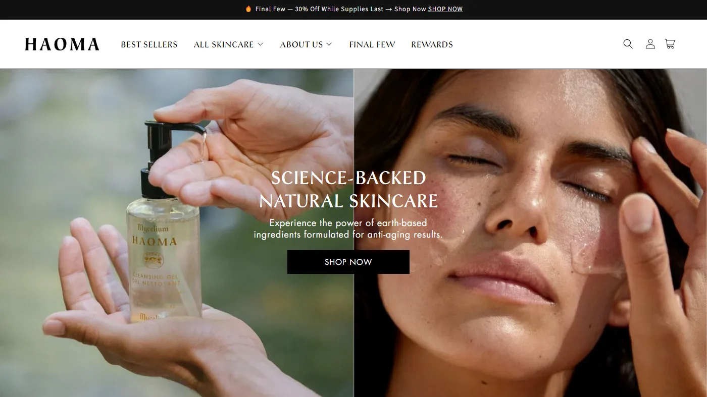 The HAOMA homepage: a split hero of hands holding a cleansing gel bottle beside a close-up face, headlined Science-Backed Natural Skincare.