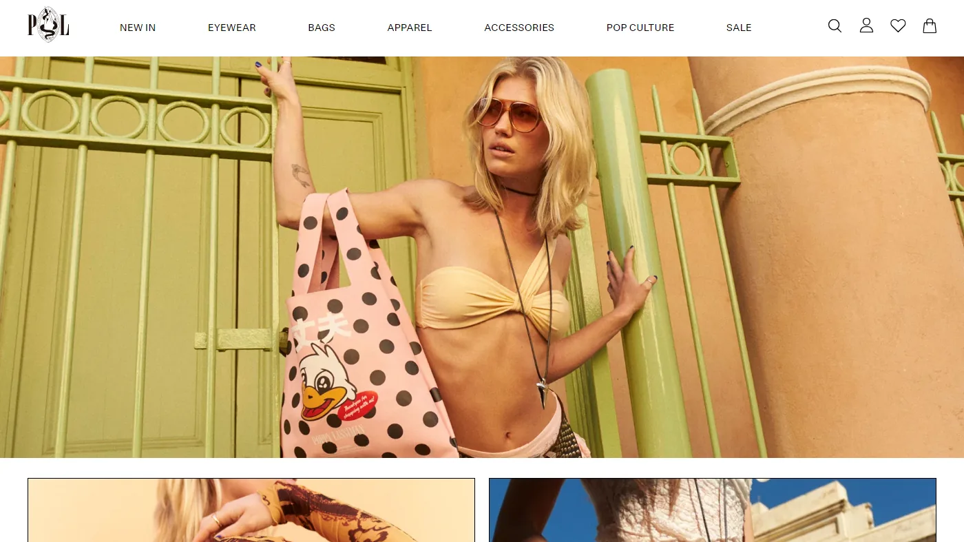 The Poppy Lissiman homepage: the PL monogram and category nav above a model in sunglasses holding a pink polka-dot tote.